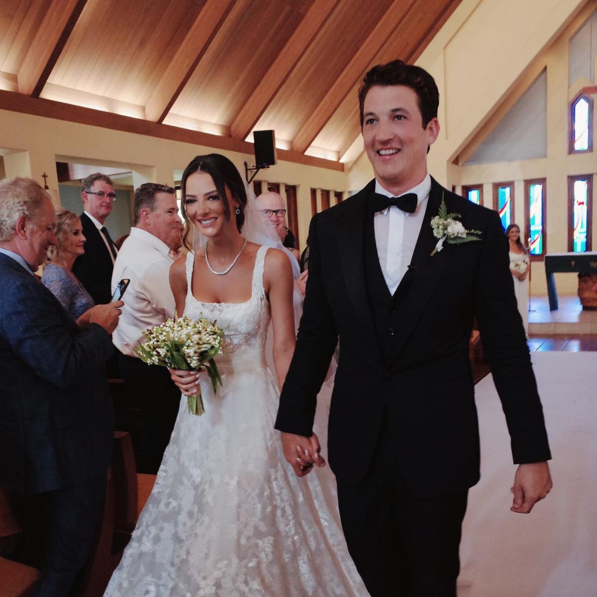 Photo of Keleigh Sperry and her husband, Miles Teller during their wedding ceremony.